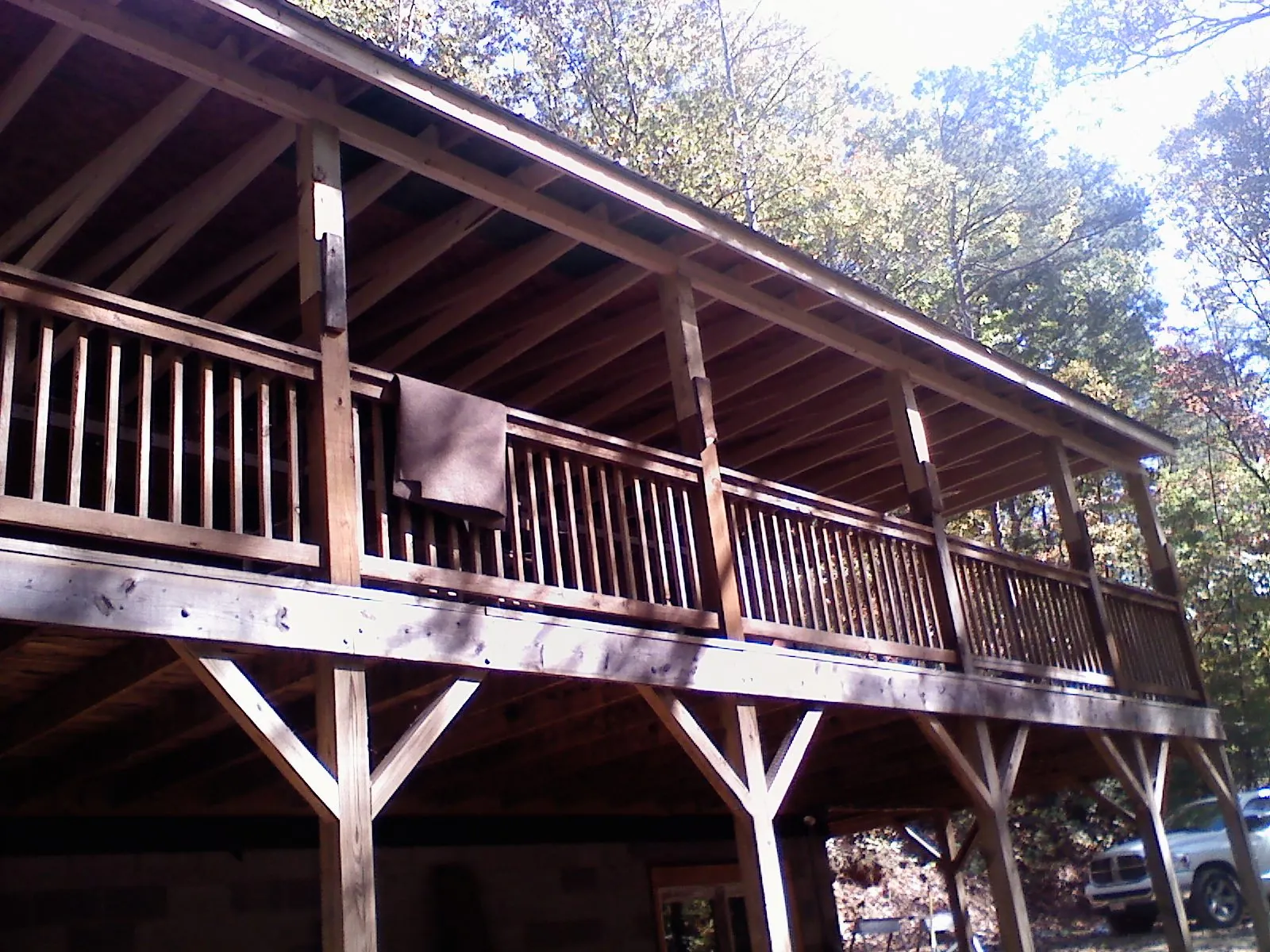 Timber framing under a new elevated porch and deck — Roof Leak Repair in Houston by Roofing Brothers